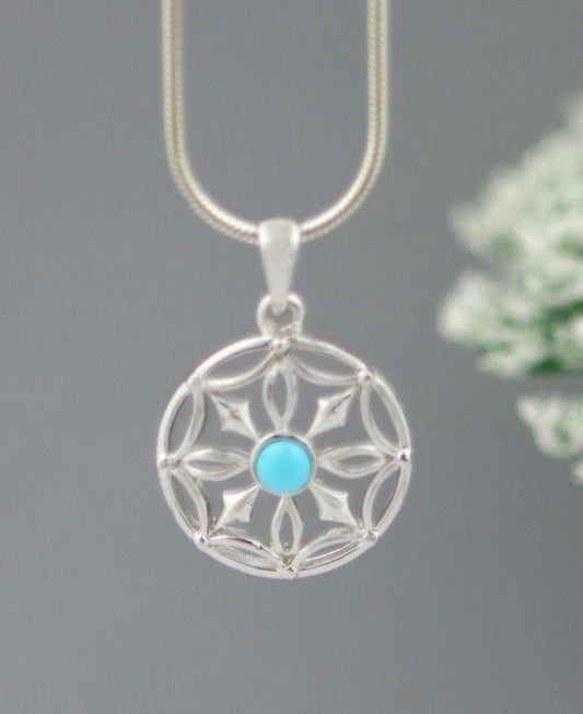 Dharma Wheel Pendant In Stainless Steel And Turquoise